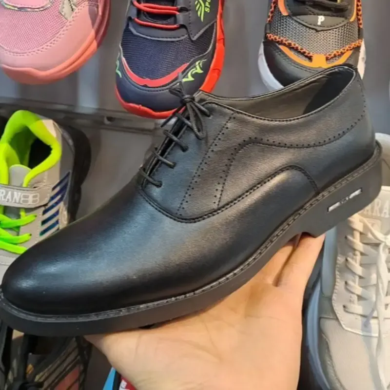کفش مردانه رسمی و مجلسی مدل صدرا رویه چرم خارجی درجه یک زیره پلیمر رنگ مشکی و قهوه ای سایز 40 تا 44